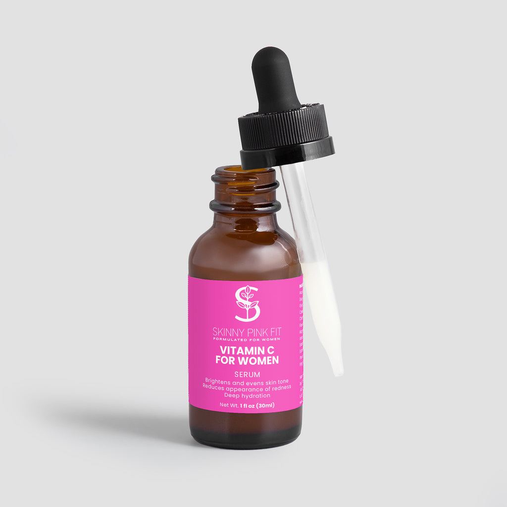 Vitamin C serum bottle with pink label on a light gray background Skinny Pink Fit